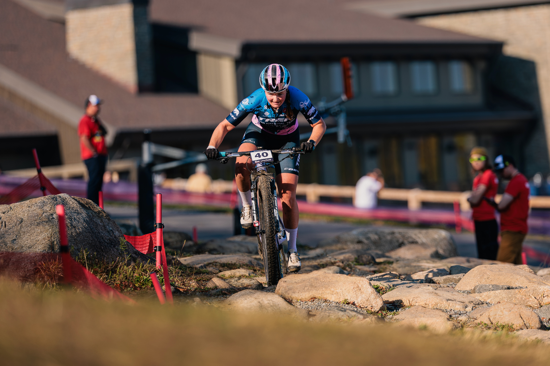 Bayli racing through a technical rock garden
